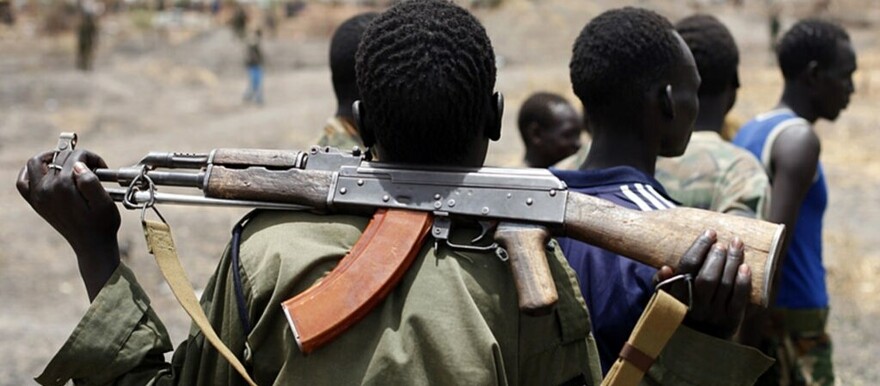 A South Sudanese soldier holds his rifle. Civilians own most of the small arms in South Sudan. (Reuters/File)