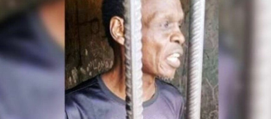 Abraham Chol behind bars. [File photo]