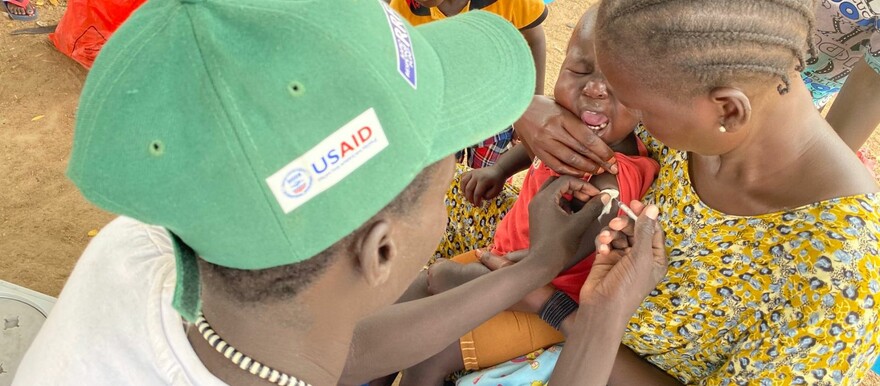 A child is vaccinated against measles at a vaccination center in Bor, Jonglei State on March 11, 2023. Credit (Citizen P Thon Aleu )