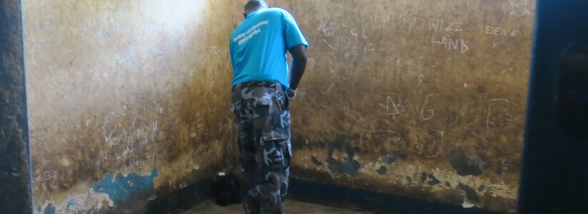 Police officer during a clean-up campaign at police stations in Northern Bahr el Ghazal State with support from UNPOL in May 2021. Photo by Emmanuel Kele/UNMISS.