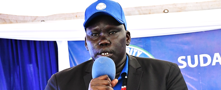 Gen. Yau Yau donning SPLM-IO's blue cap after joining the opposition group on Monday. (Courtesy photo)