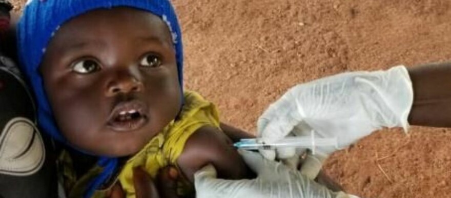 A child being vaccinated against measles in South Sudan. (Credit: WHO)