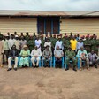 Soldiers, chiefs and civilians pose after a civil-military relations forum in Yei on 14 March 2023. [Photo: Radio Tamazuj]