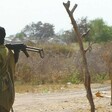 An armed individual in the town of Pibor, in the Greater Pibor Administrative Area (OCHA/Cecilia Attefors)