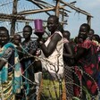 Women and children queue to receive emergency food at the United Nations Protection of Civilians (POC) site 3 in Juba on 25 July 2016. (Reuters photo)