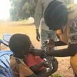 A child receives a polio vaccination in Kuajinayam in Jur River County. (Photo: Radio Tamazuj)