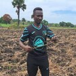 Asiki Moses, a large-scale farmer in Morobo, inspects his farm after plowing. (Photo: Radio Tamazuj)