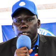 Gen. Yau Yau donning SPLM-IO's blue cap after joining the opposition group on Monday. (Courtesy photo)