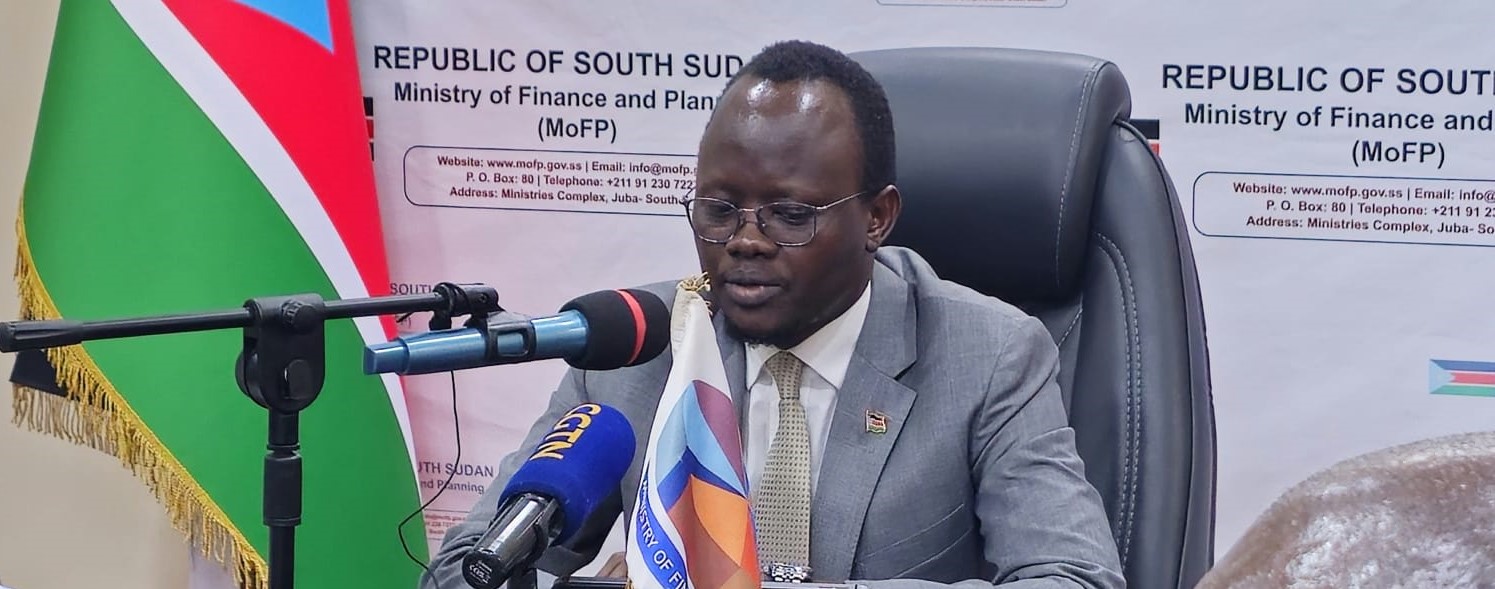 Finance minister announces tough budget cuts and new taxes