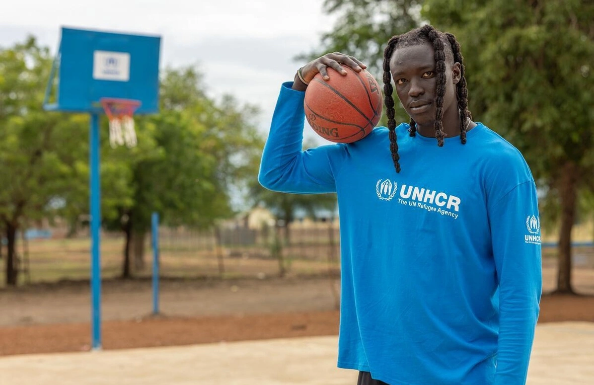 Former refugee Wenyen Gabriel becomes first professional basketball player appointed UNHCR Goodwill Ambassador